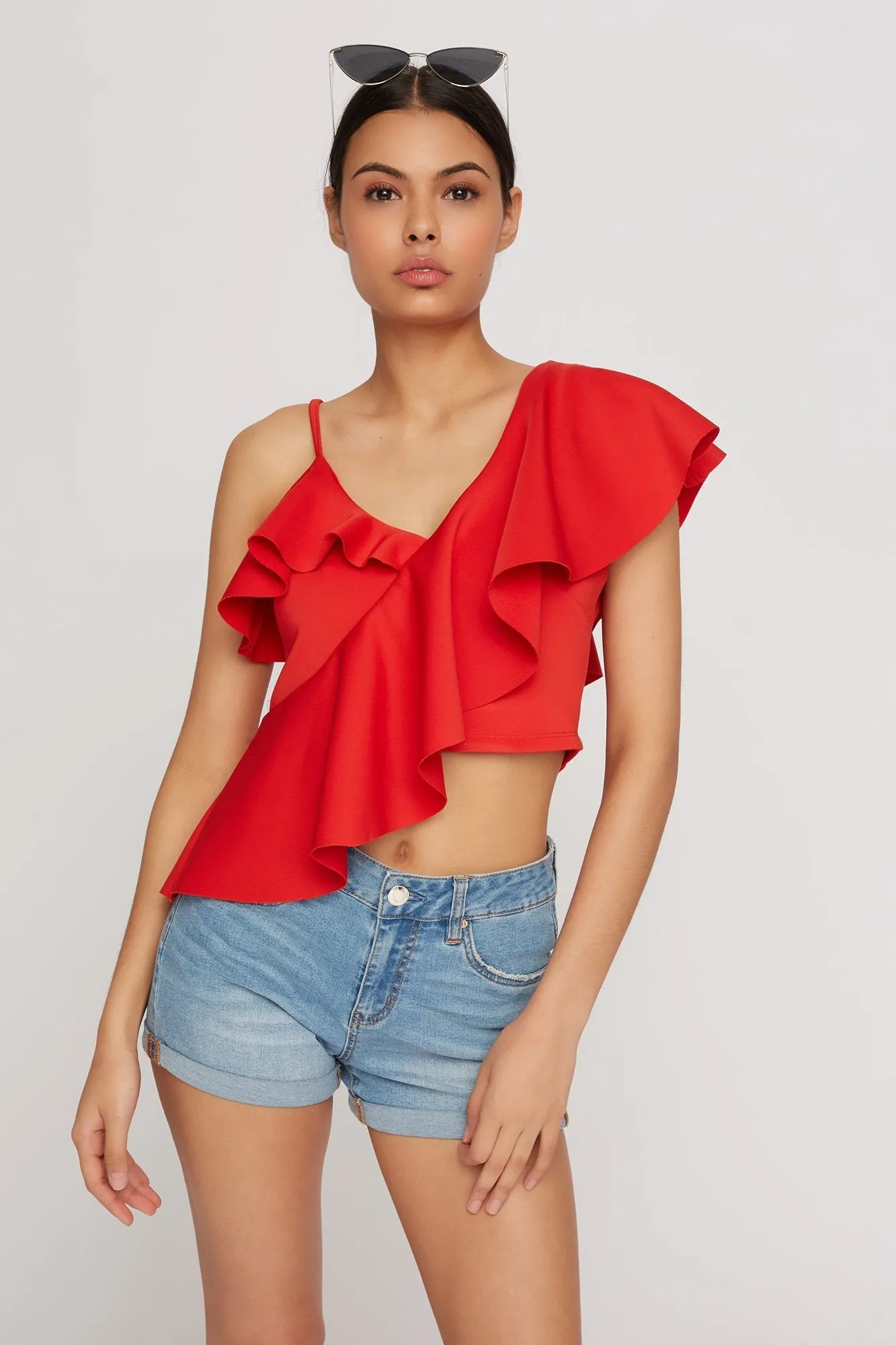 Blouse courte asymétrique de style plongée volantée à épaule unique