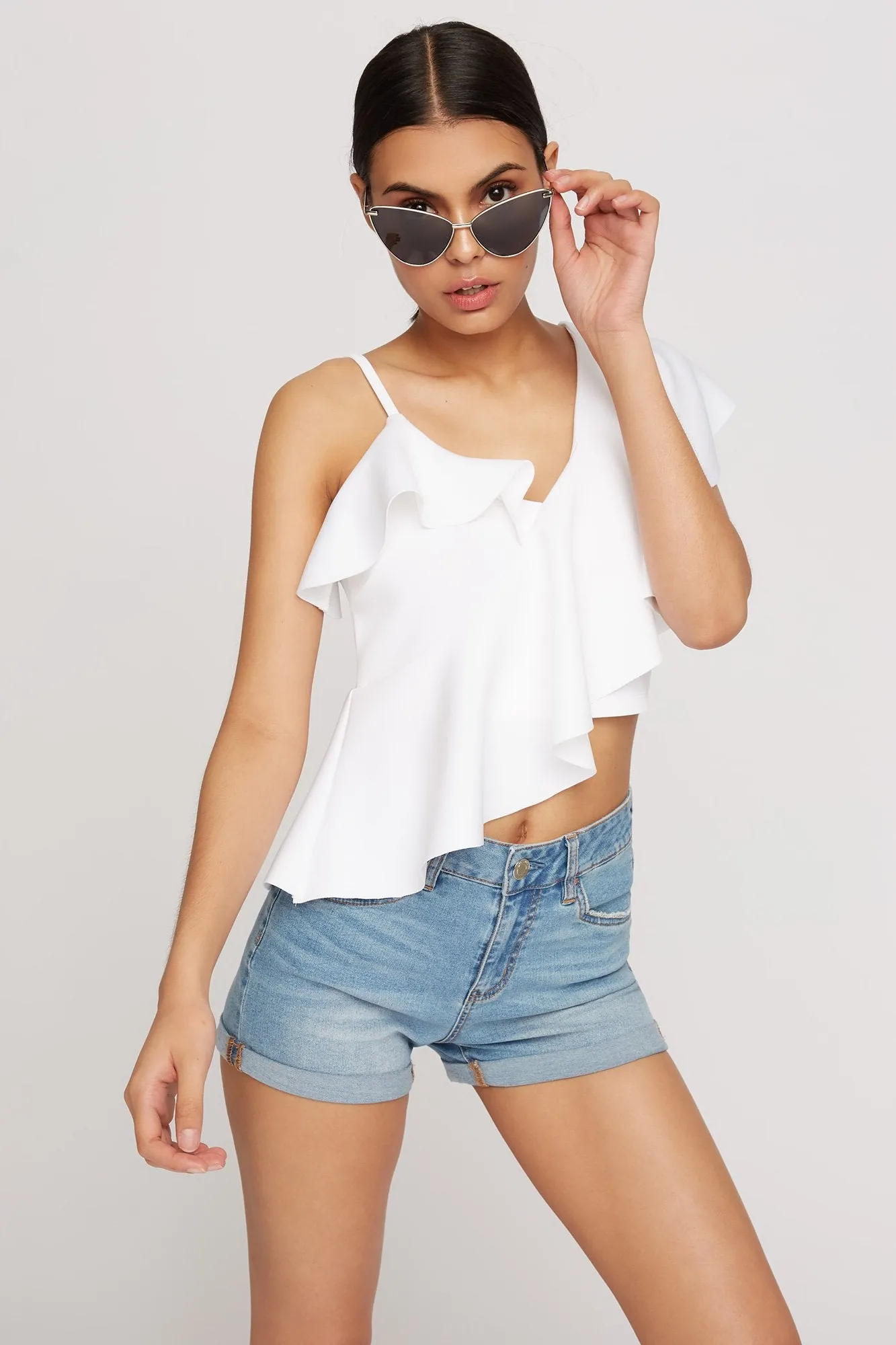 Blouse courte asymétrique de style plongée volantée à épaule unique